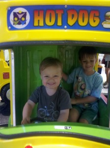 The boys, driving a hot dog truck