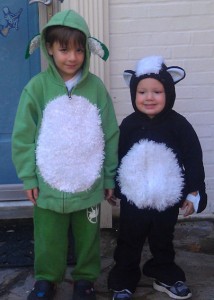 A green dog and a skunk