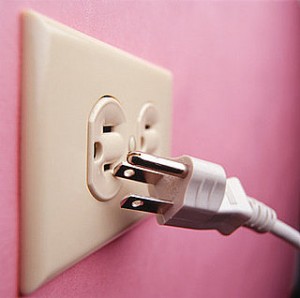 Unplugged, plug on a pink wall Unplugged, plug on a pink wall