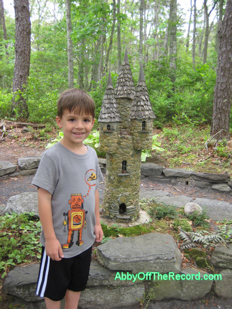 FairyGarden my son at a fairy garden in Cape Cod